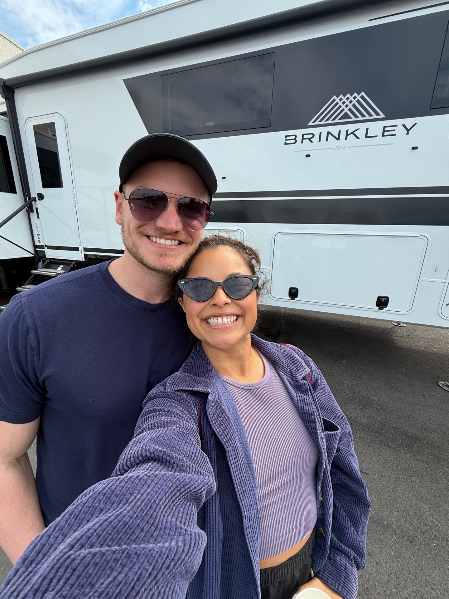 Sophia and Lucas picking up their Brinkley RV